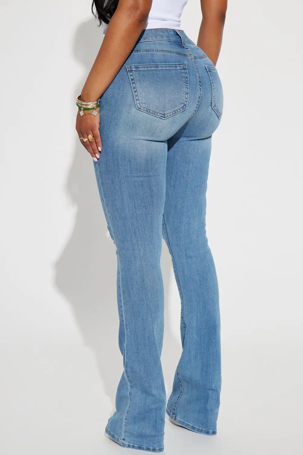 Jessie Mid Rise Distressed Bootcut Jean - Light Blue Wash