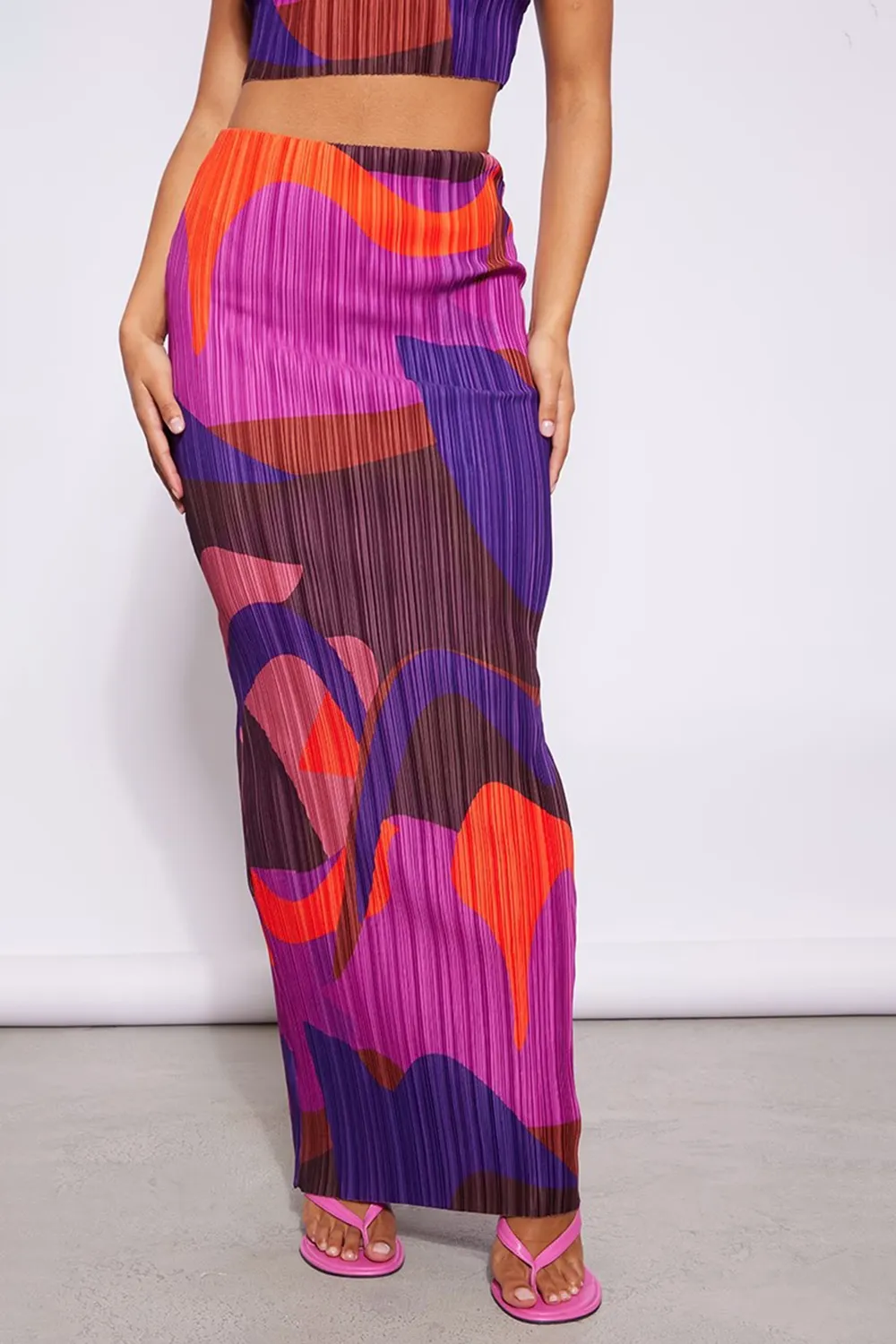 Pink Printed Plisse Strappy Turtleneck Top And Skirt Set