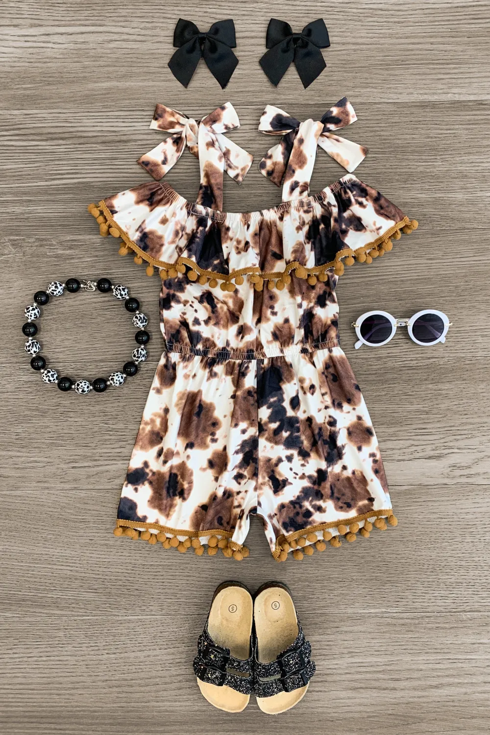 Cow Print Pom Pom Romper