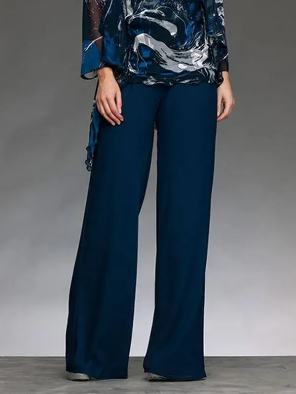 Elegant lady's three-piece suit with printed cardigan