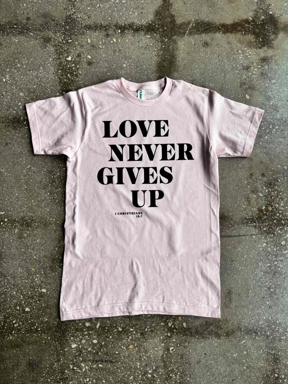 Love Never Gives Up Adult Box T-Shirt