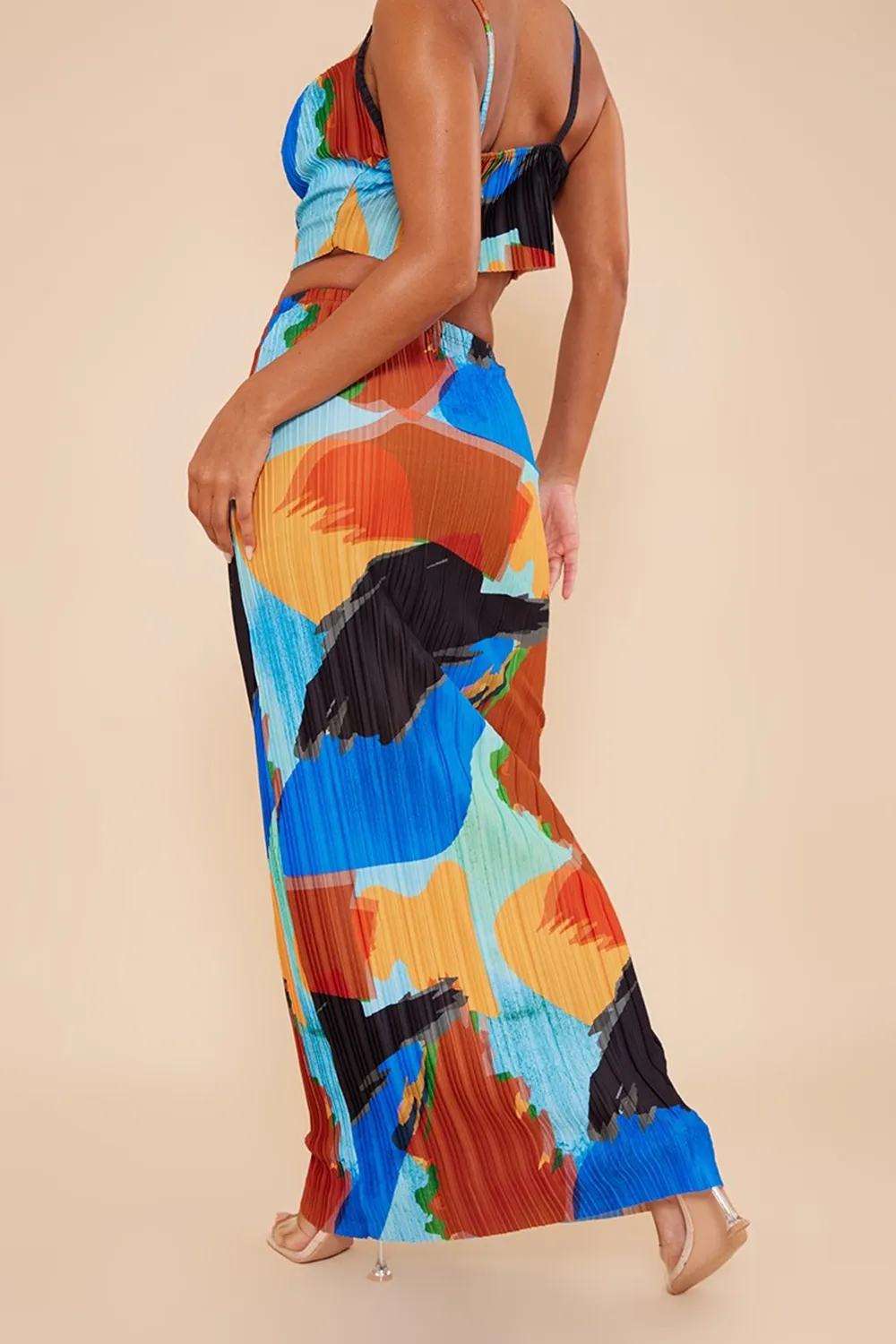 blue abstract print plisse strappy cowl neck top and skirt set