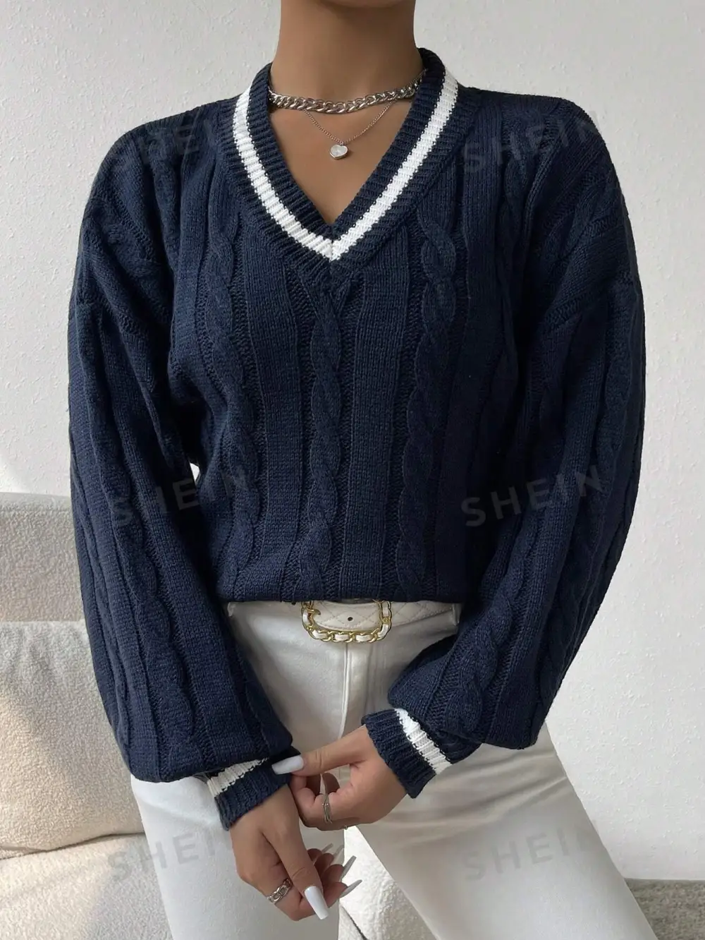 Sweater ribete de rayas tejido de cable de hombros caídos