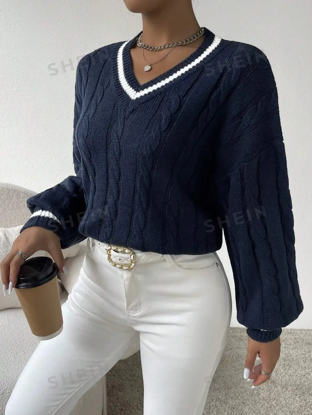 Sweater ribete de rayas tejido de cable de hombros caídos