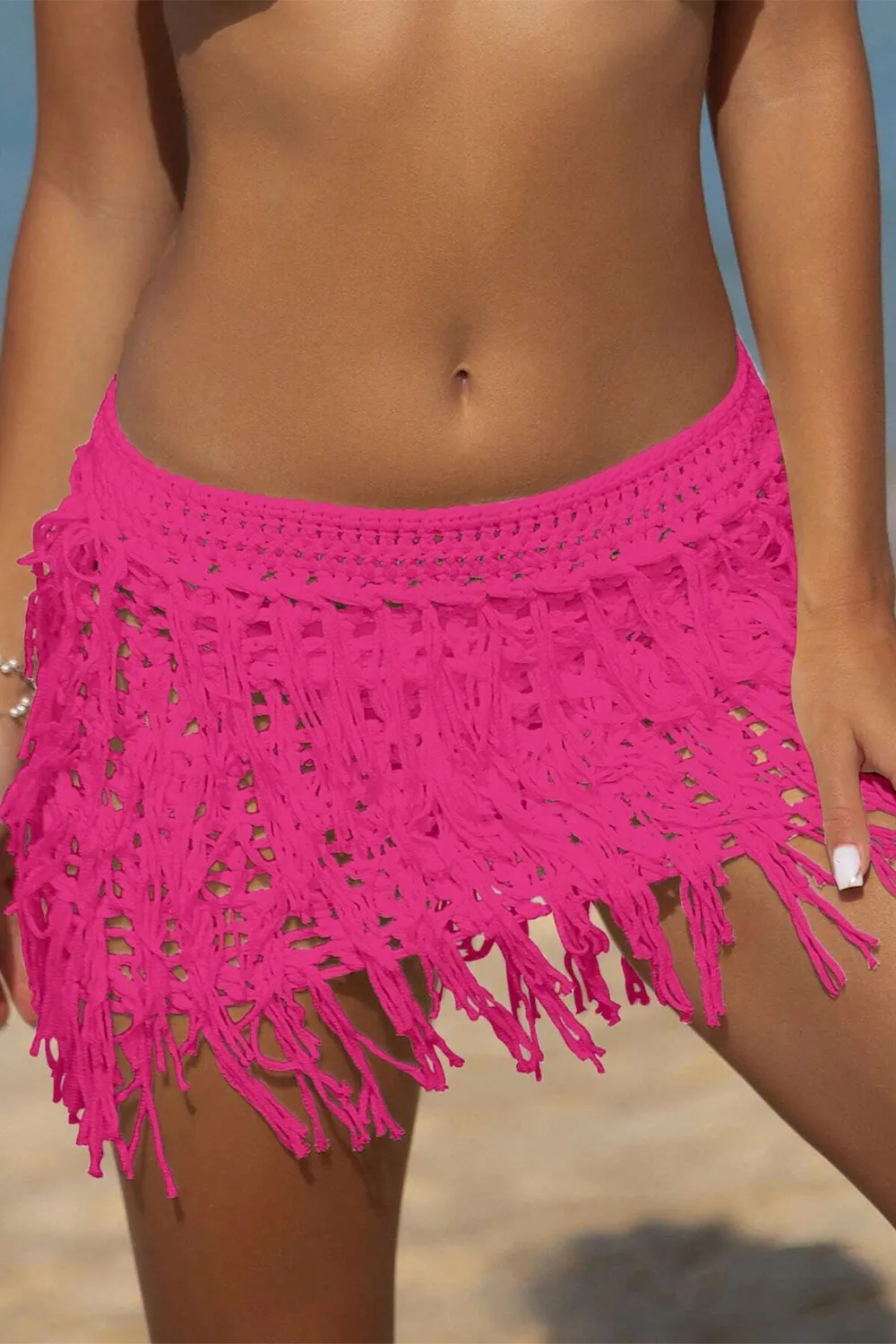 Crocheted beach cover-up skirt with cutout fringe hem
