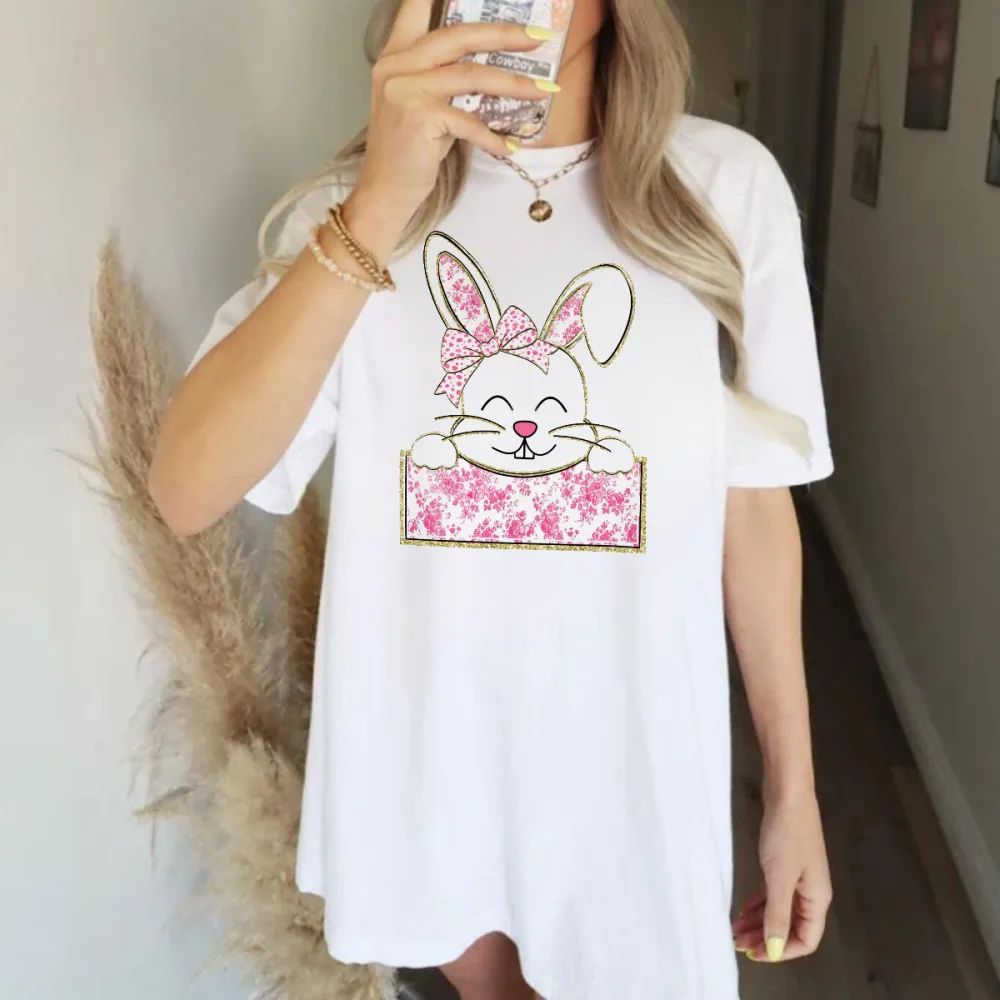 A Cute Cartoon Rabbit Pattern, The Rabbit Is Wearing A Pink Floral Bow, With Its Two Front Paws Resting On A Pink Floral Sign, Casual T-Shirt