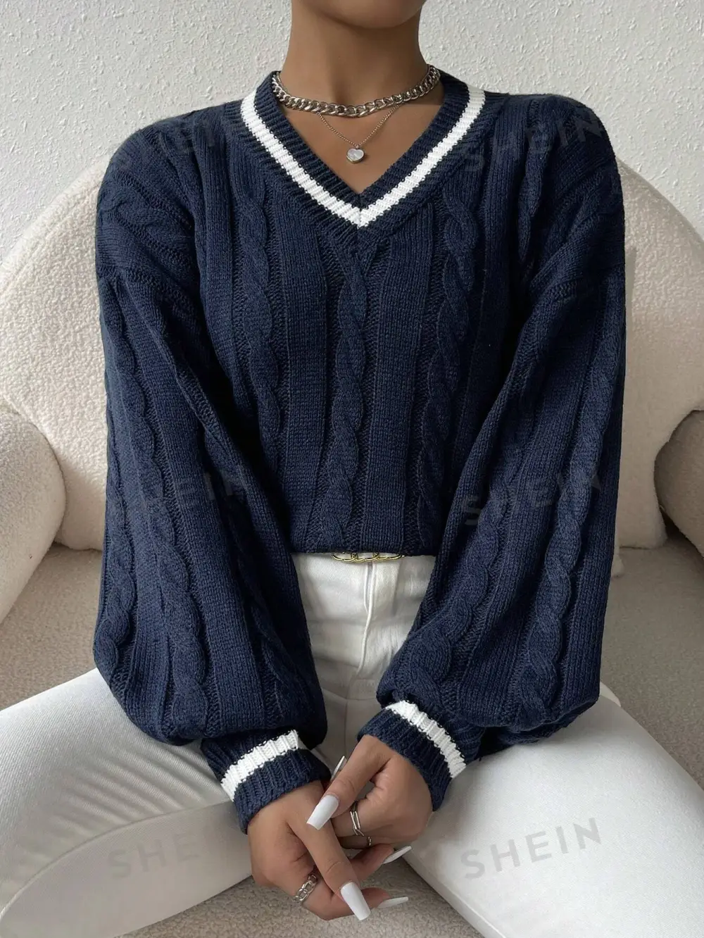 Sweater ribete de rayas tejido de cable de hombros caídos