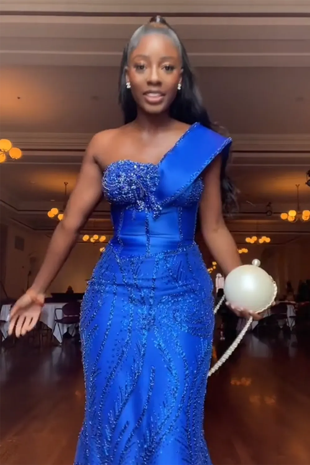 Custom sequined one-shoulder gown