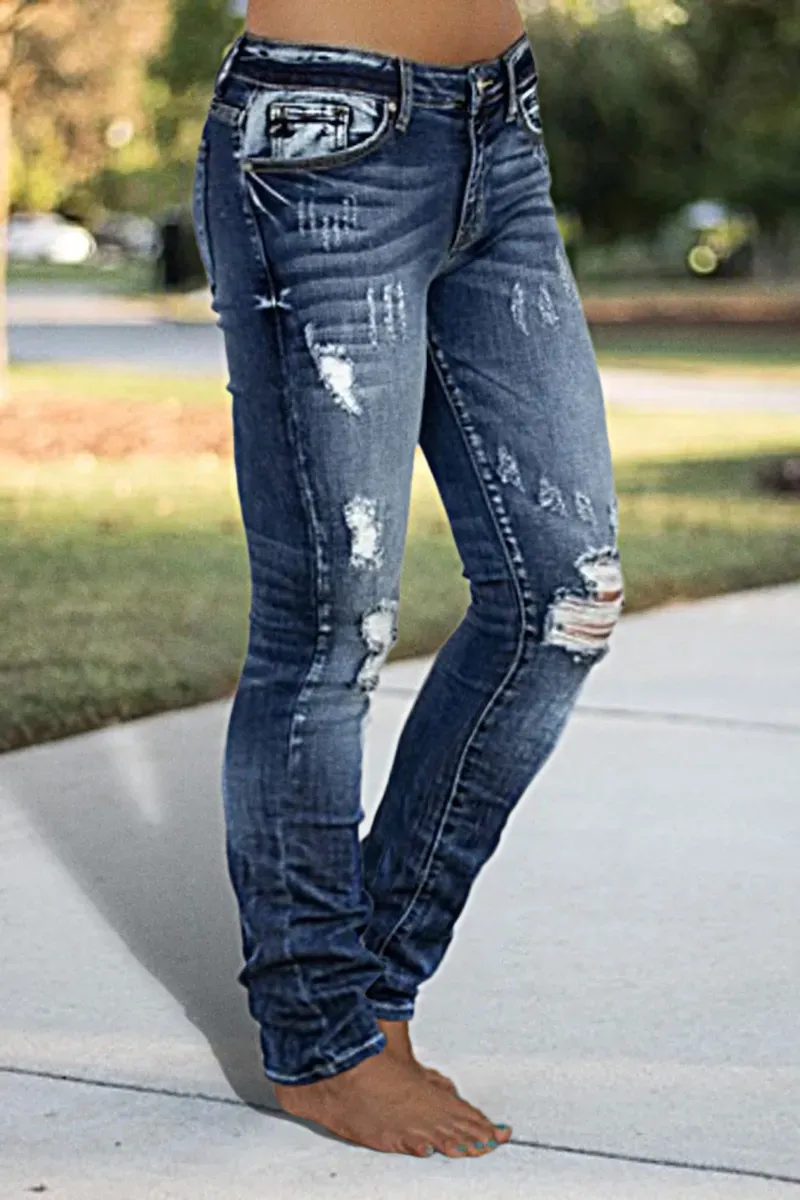 Distressed Low Rise Skinny Jeans