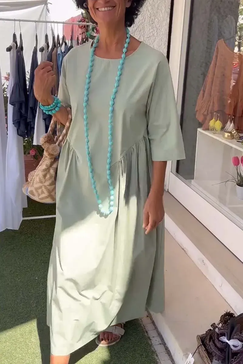 Women's dress with irregular waistline design