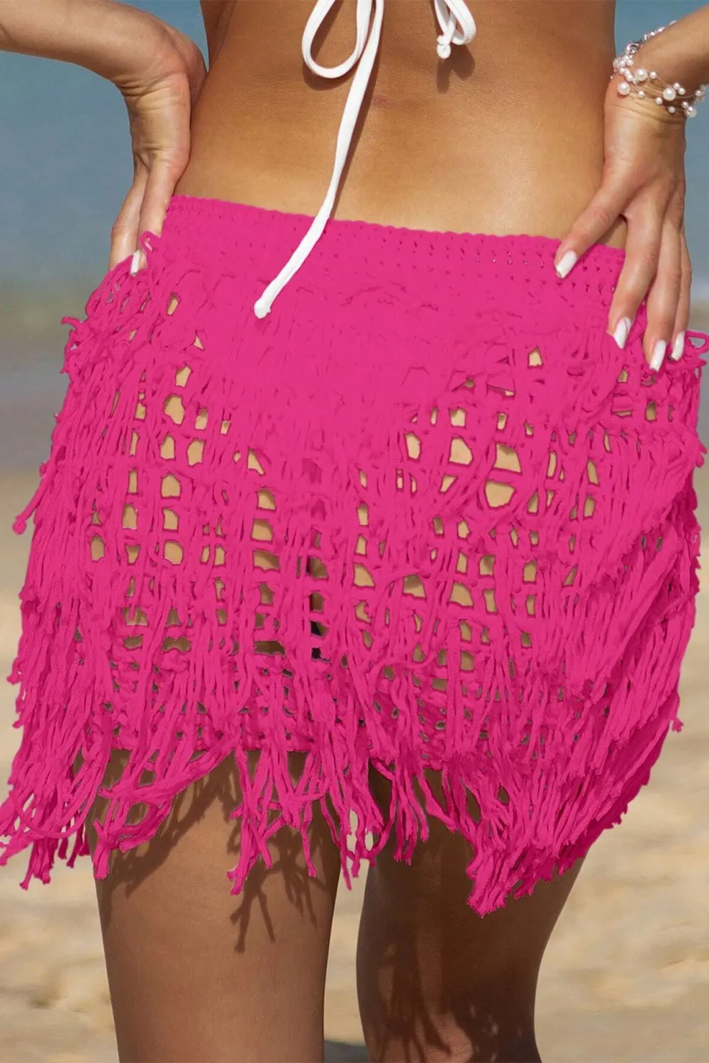 Crocheted beach cover-up skirt with cutout fringe hem