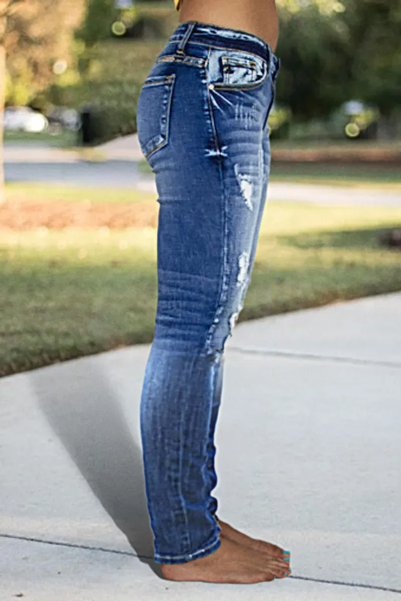 Distressed Low Rise Skinny Jeans