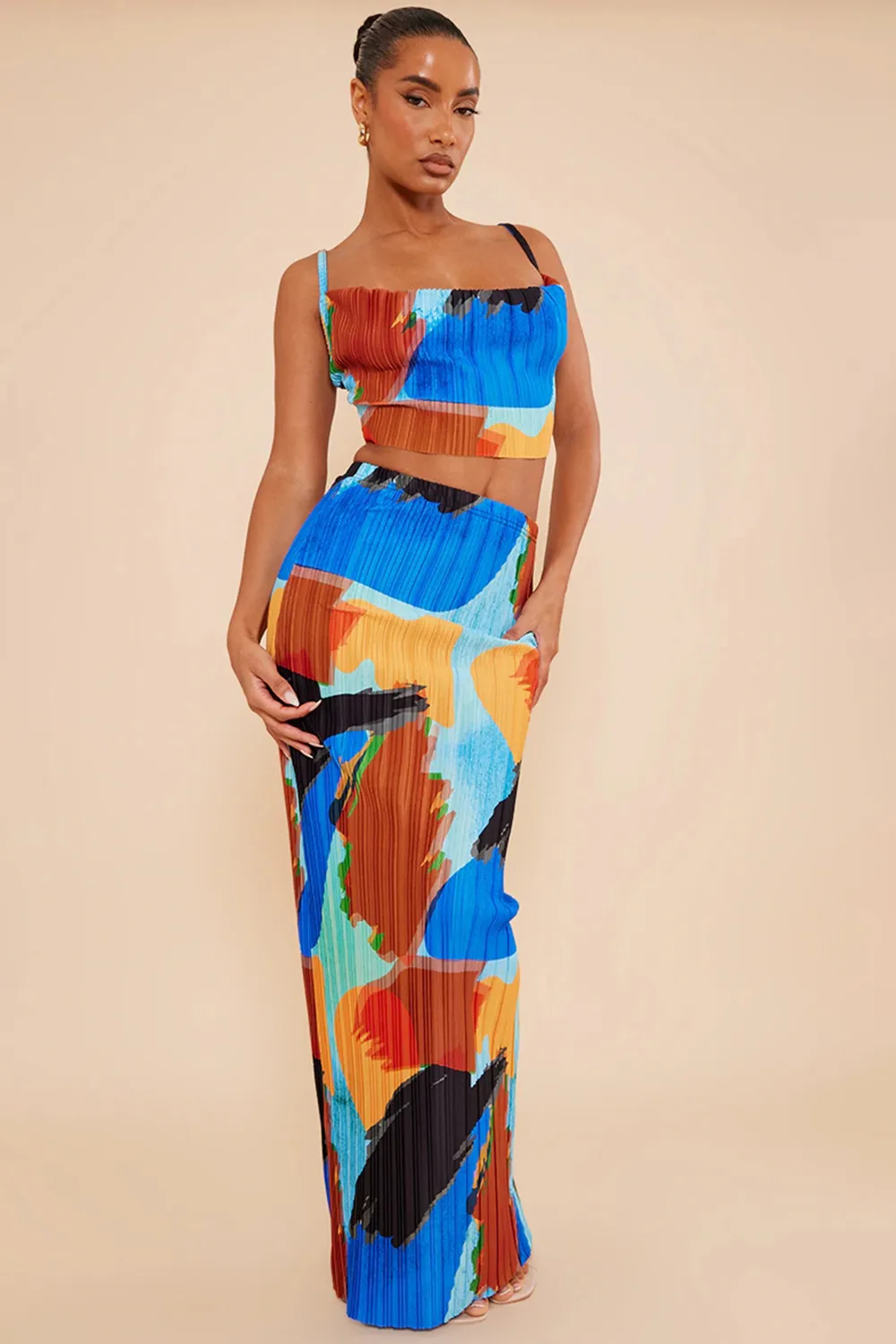 blue abstract print plisse strappy cowl neck top and skirt set