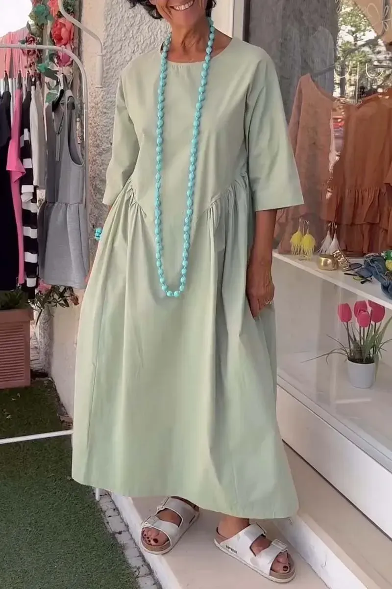 Women's dress with irregular waistline design