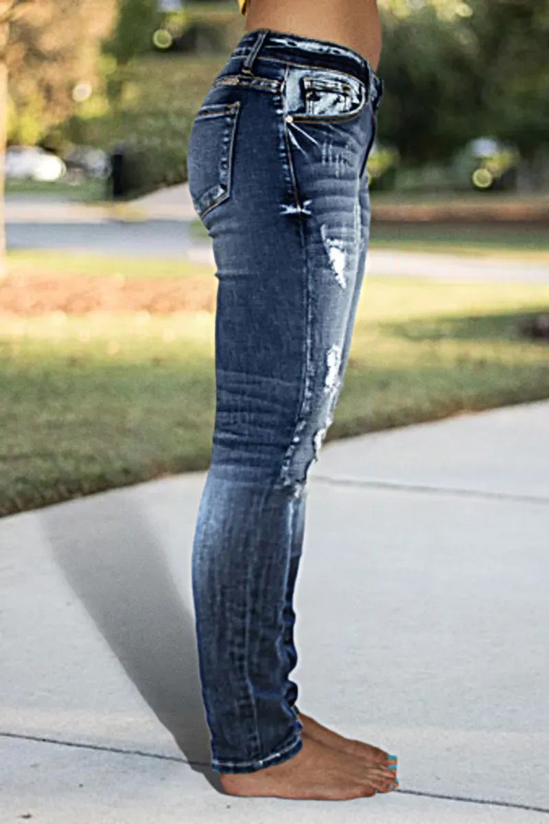 Distressed Low Rise Skinny Jeans