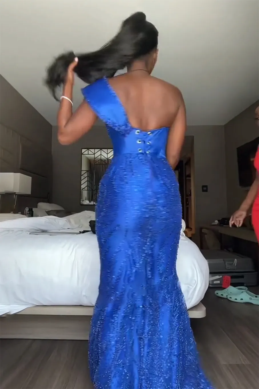 Custom sequined one-shoulder gown