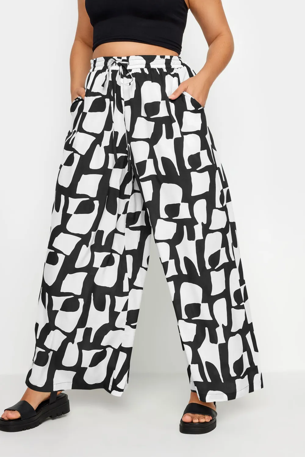 Yours Curve Black Leaf Print Drawstring Wide Leg Trousers